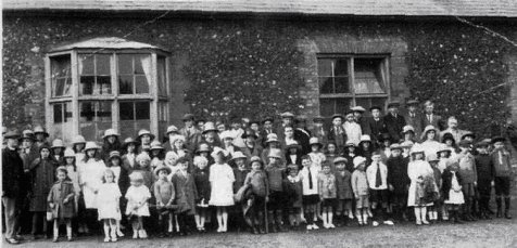 St. Mary's Church Sunday School outing about 1922, Rev. C. Nash on left.